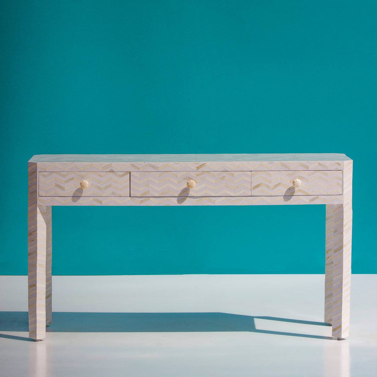 Veyra Chevron Inlay Three-Drawer Console Table – White
